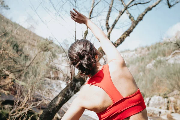 Young Woman Exercising Sport Clothes Front Waterfall Autumnal Day River — 스톡 사진