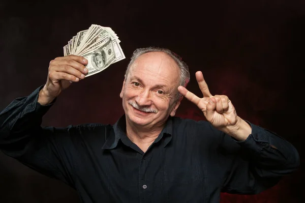 ドル札を歳の男性 — ストック写真