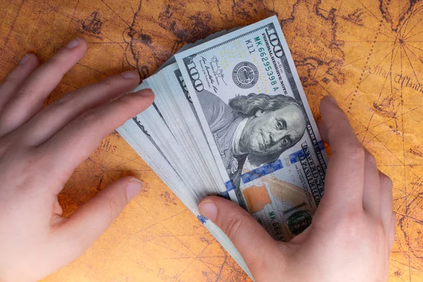 Hands holding cash USD dollar banknotes.  Currency,  Cash, Bill Concept