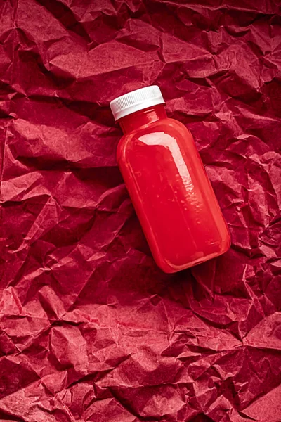 Fresh berry juice in eco-friendly recyclable plastic bottle and packaging, healthy drink and food product