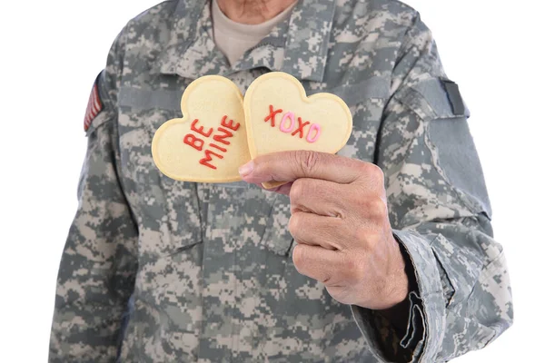 Closeup Soldier Holding Two Heart Shaped Valentines Day Cookies One — Stock Photo, Image