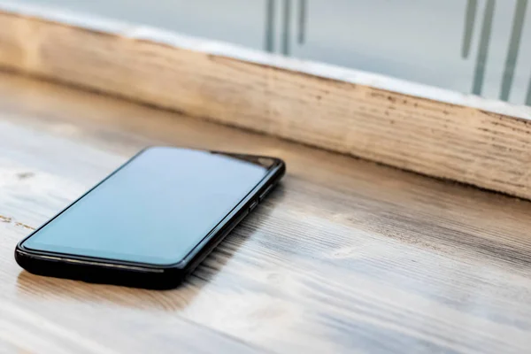 Mobile Phone Wooden Table Closeup — Stockfoto