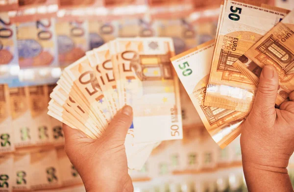 Euro bills in female hands. Euro cash background of money, fan of 50 euros