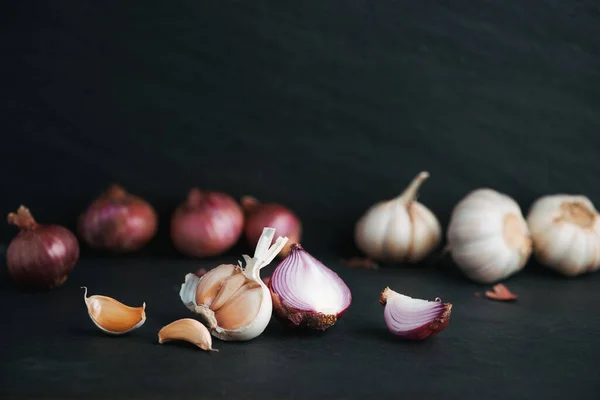 Garlic Onion Black Stone Table —  Fotos de Stock