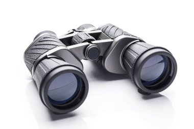 Single black pair of binoculars isolated on a white background
