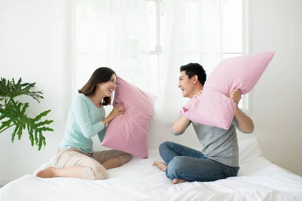 Happy Asian Couple Having Pillow Fight Bed Home Family Fun — Stock Photo, Image