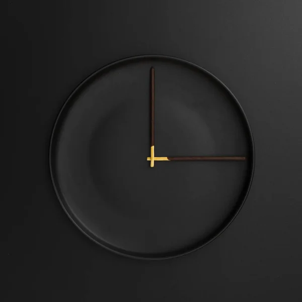 초콜릿 스틱이 접시가 시계를 만든다 — 스톡 사진