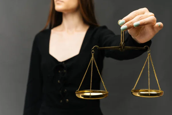 Serious Woman Holding Justice Scale Dark Background — Stock Photo, Image