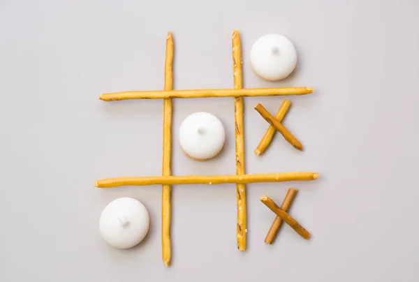 Tic Tac Toe Crackers Sticks Gray Background Food Concept Edible — Stock Photo, Image