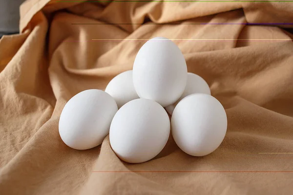 米色背景的六个白色鸡蛋 — 图库照片