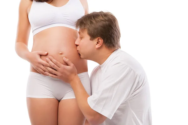 Happy Young Father Kissing Belly Pregnant Wife — Stock Photo, Image