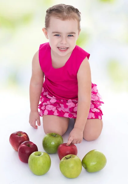 stock image little girl with apples