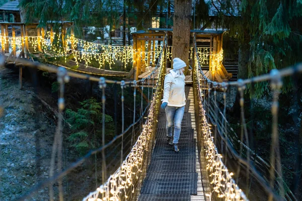 Woman Suspension Bridge Evening Christmas Lights — Stock Photo, Image