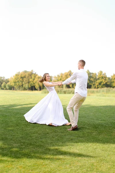 Happy Caucasian Groom Bride Dancing Grass — стоковое фото