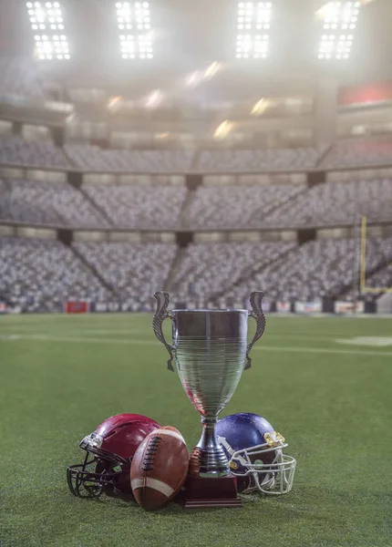 closeup of american football,helmets and trophy