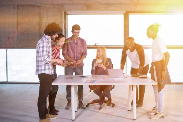 stock image female manager giving money bonus to her employees