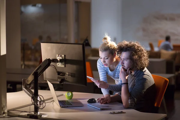 stock image young designers in the night office