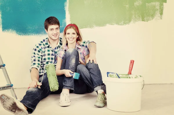 Happy Young Couple Relaxing Painting New Home — Stock Photo, Image