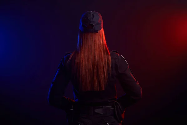 Serious Female Police Officer Posing Camera Black Background Red Blue — Stock Photo, Image