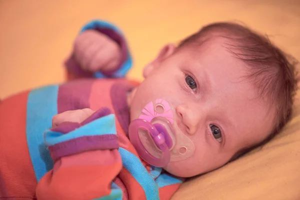 stock image One month newborn baby sleeping  in bed