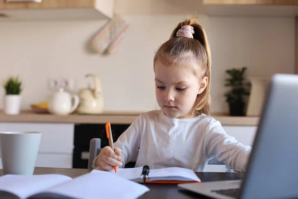 Serious Little Girl Handwrite Study Online Using Laptop Home Cute — Stock Photo, Image