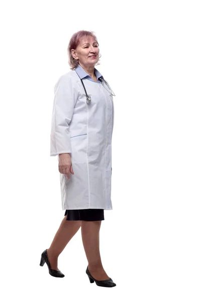 Smiling Woman Doctor Striding Forward Isolated White — Stock Photo, Image