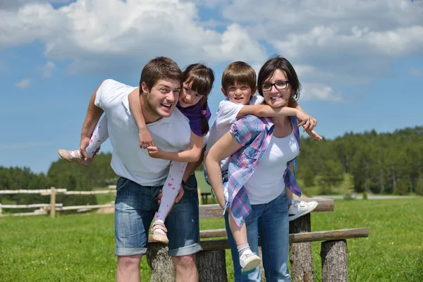 Happy Young Family Have Fun Outdoors Stock Picture
