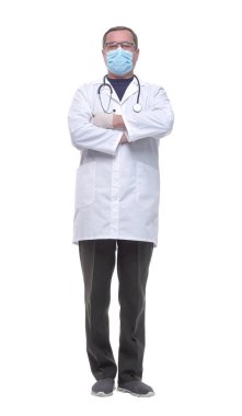 Tam gelişim. Koruyucu maskeli endişeli bir terapist .