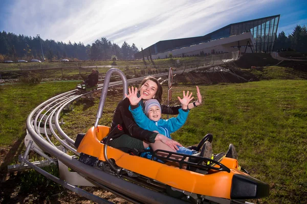 Young Mother Son Driving Alpine Coaster — Stock Photo, Image