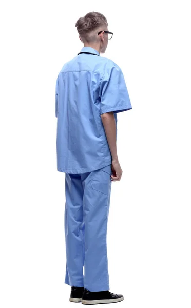 身穿蓝色制服的医生在白屏上看广告 — 图库照片