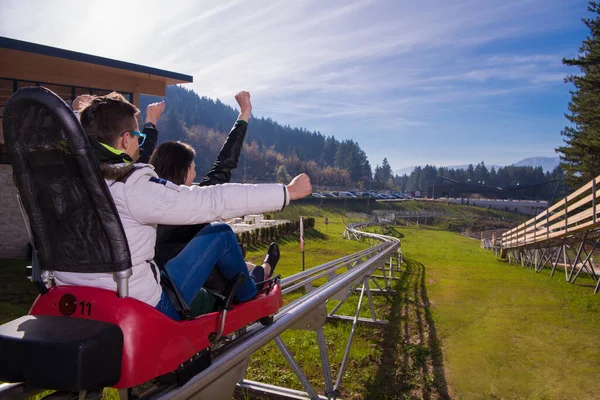 Couple Driving Alpine Coaster — Stock Photo, Image