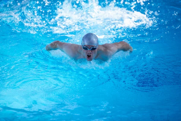 stock image swimmer exercise on indoor swimming pool