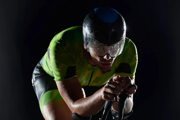 Triathlon Athlete Riding Bike Fast Night — Stock Photo, Image
