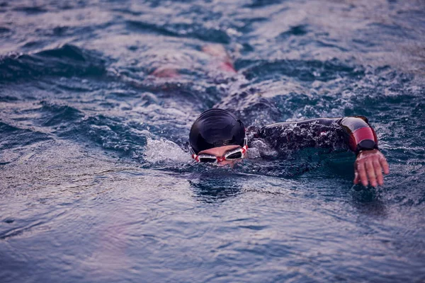 Triathlon Athlete Swimming Lake Sunrise Wearing Wetsuit — Stock Photo, Image
