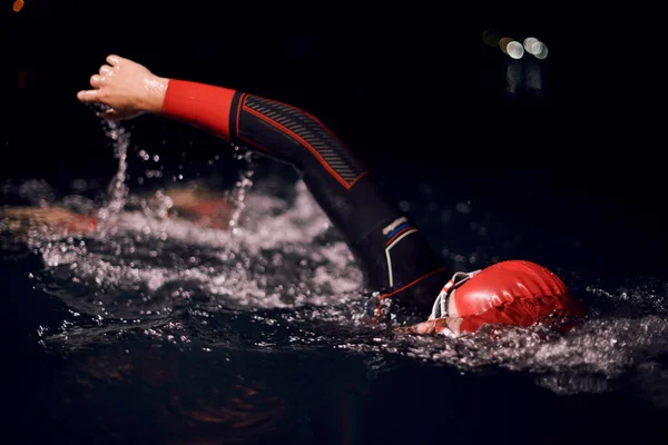 Triathlon Athlete Swimming Dark Night Wearing Wetsuit — Stock Photo, Image