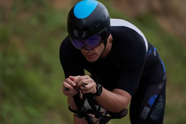 Triathlon Athlete Riding Bike Wearing Black — Stock Photo, Image