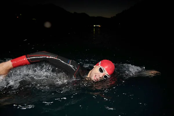 Triathlon Athlete Swimming Dark Night Wearing Wetsuit — Stock Photo, Image