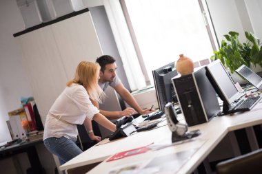 designers in office at the wooden furniture manufacture