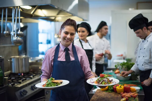 Young Waitress Showing Dishes Tasty Meals — Stock Photo, Image