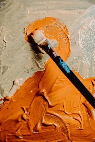 Painted Color Background, Abstract Orange Paint Texture. Paint brush with texture. Copy space