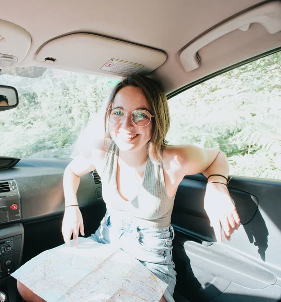 Portrait Young Woman Smiling Car Road Trip Directions Reading Map — Stock Photo, Image