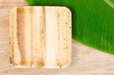 Kitchenware made from dried betel nut leaf palm, natural material.