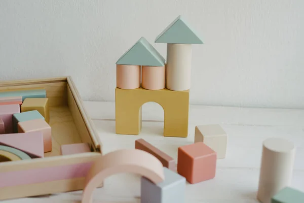 Toys made of natural wood. Child development concept.