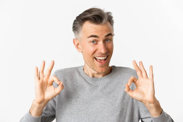 Close Handsome Middle Aged Man Showing Okay Signs Looking Amazed — Stock Photo, Image