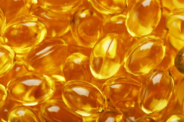 Golden Vitamin Capsules Close Full Screen — Stock Photo, Image