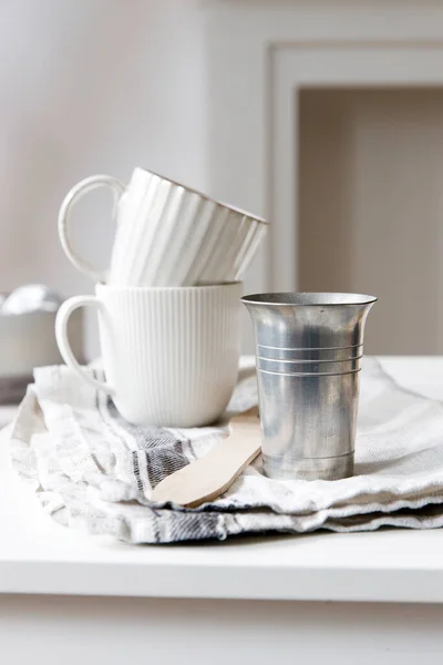 Two White Mugs Kitchen Towel Napkin Wooden Frying Utensils Table — Stock Fotó