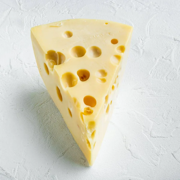 Maasdam Käse Auf Weißer Steinoberfläche Quadratisch — Stockfoto