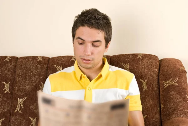 Man Reads News Sofa Home — Stock Photo, Image