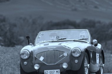 ITALY - October 23, 2020: PORSCHE 356 SPEEDSTER on an old racing car in rally Mille Miglia 2020 the famous italian historical race (1927-1957) clipart