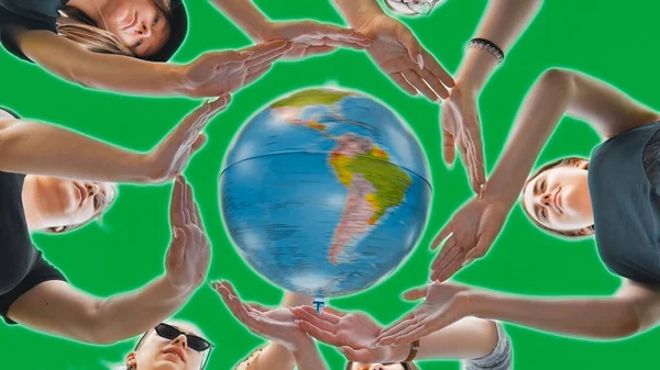 Schoolgirls Hug Earth Globe Hands Making Circle Out Them Green — Stock Photo, Image